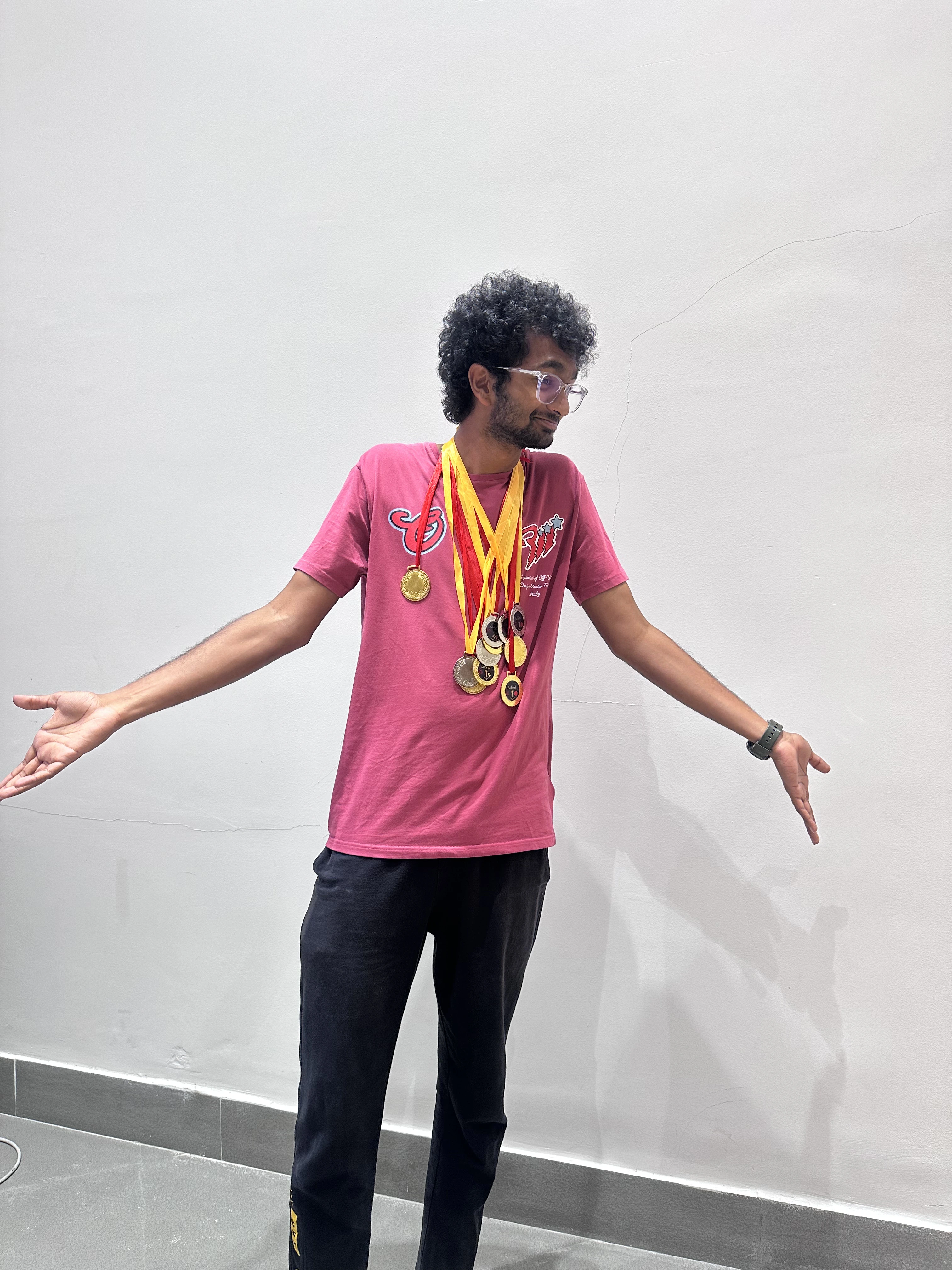 Ashwath Kumar wearing medals